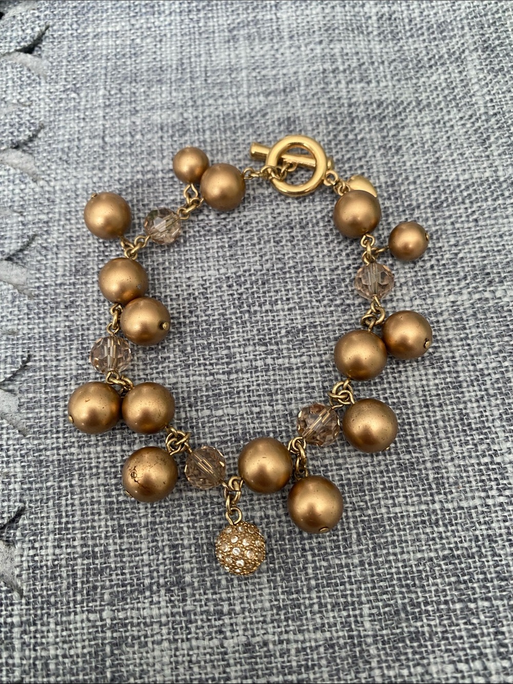 Carolee Gold-Tone Beaded Charm Bracelet with Crystal Accent